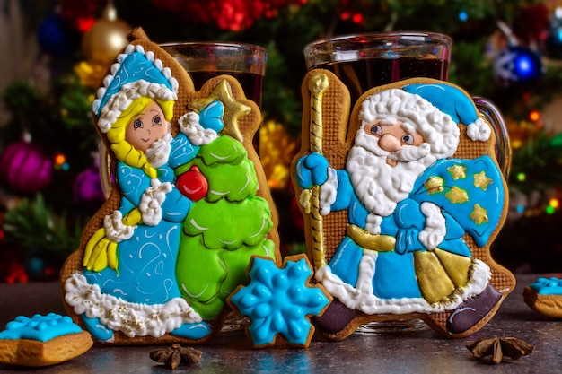 Christmas gingerbread in the shape of Santa Claus and Snow Maiden homemade cookies