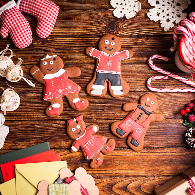 Christmas gingermen family on a wooden table