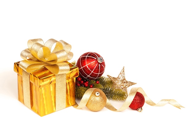 Christmas gold gift box isolated on white