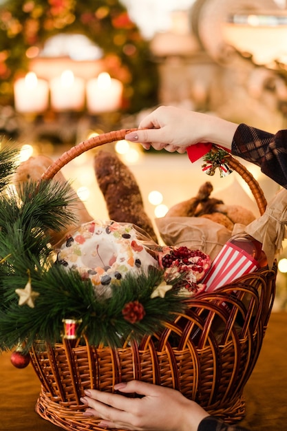 Christmas goods in a basket professional handmade assortment of delicious festive food Great present on different holidays Preparation for holidays