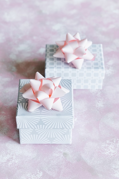 Christmas gray gift boxes with pink bows