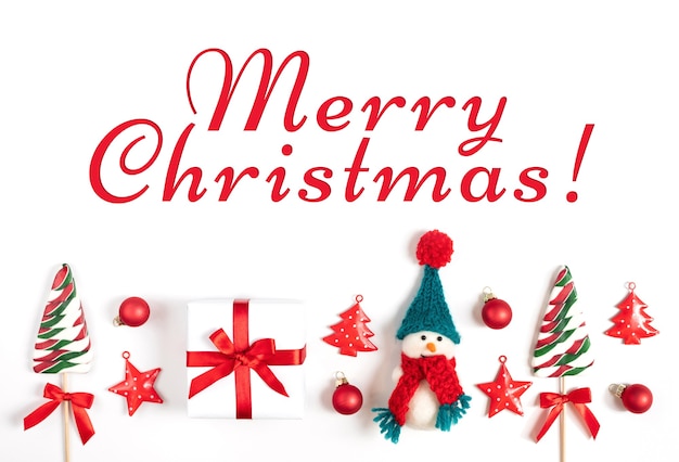 Christmas greeting card with Christmas decorations on a white background.