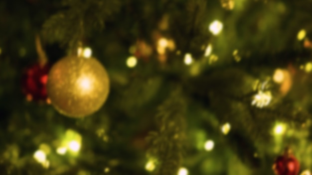 Christmas home room with tree and festive bokeh lighting, blurred holiday background