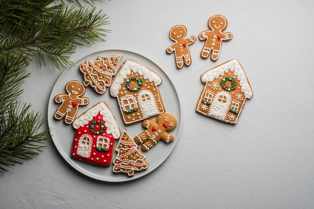 Christmas homemade gingerbread cookies on a gray surface