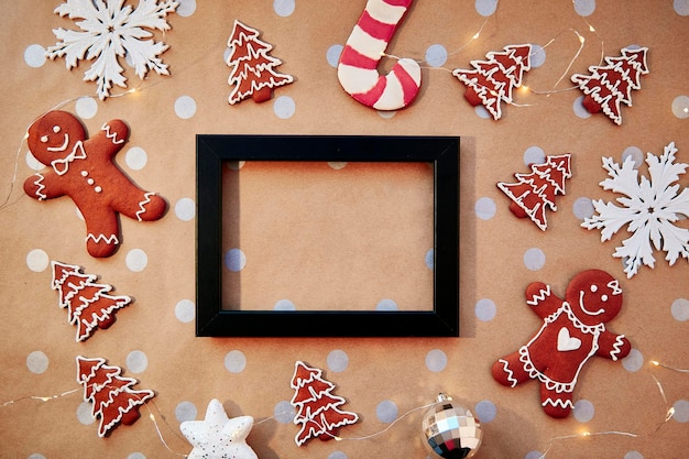 Christmas homemade gingerbread cookies with mock up frame Homemade baking cookies Festive aesthetic card Christmas atmosphere Merry Christmas and home coziness concept