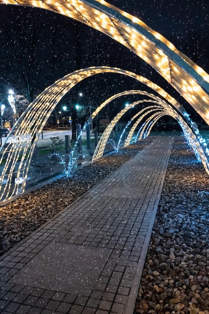 Christmas illumination in a city street at night.