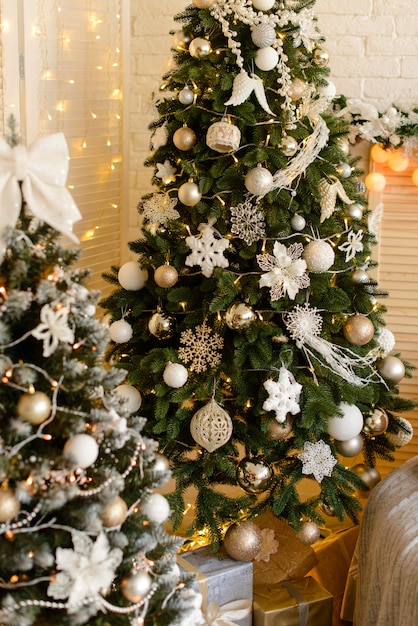 Christmas interior with gift boxes and Christmas fires