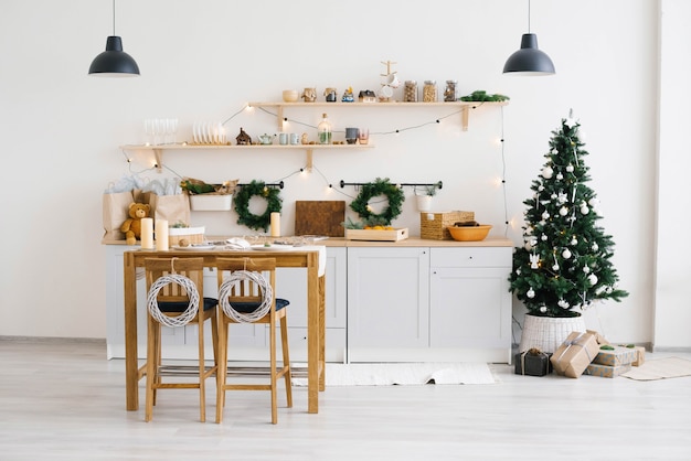 Christmas kitchen decor. The rustic kitchen for Christmas. Details of Scandinavian cuisine in light color.