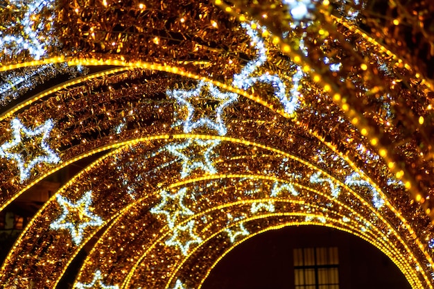 Christmas lights tunnel with stars in park