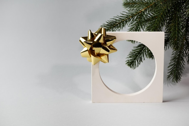 Christmas mock up with white podium on grey background with christmas decor Place for christmas product presentation New year cosmetic podium Christmas advertising New Year mockup