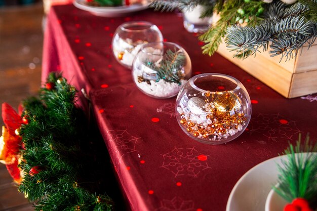 Christmas mood holiday atmosphere Festive table decor on a wooden veranda