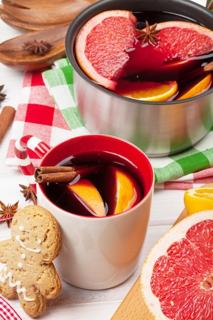 Christmas mulled wine on wooden table