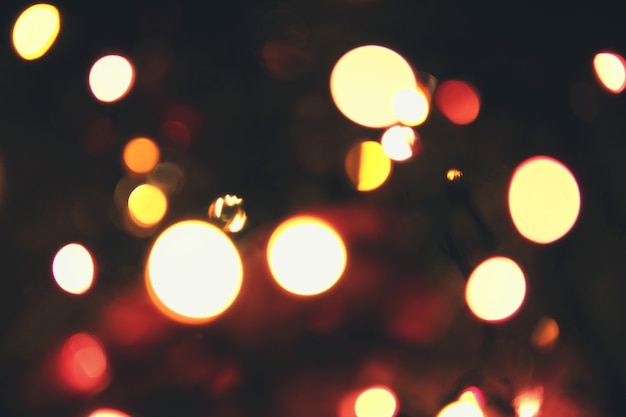 Christmas multicolor bokeh background with defocused lights.