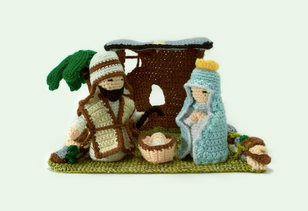 Christmas nativity scene of the baby Jesus in the manger with Mary and Joseph, handmade with crochet