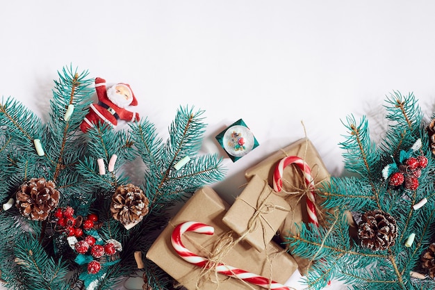 Christmas or new year background furtree branches gifts decoration on a white background