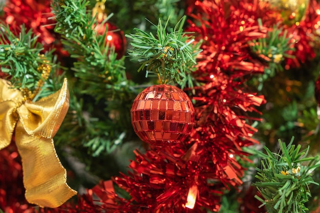 Christmas and New Year Decoration Baubles hanging on Christmas Tree