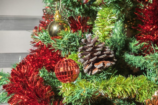 Christmas and New Year Decoration Baubles hanging on Christmas Tree