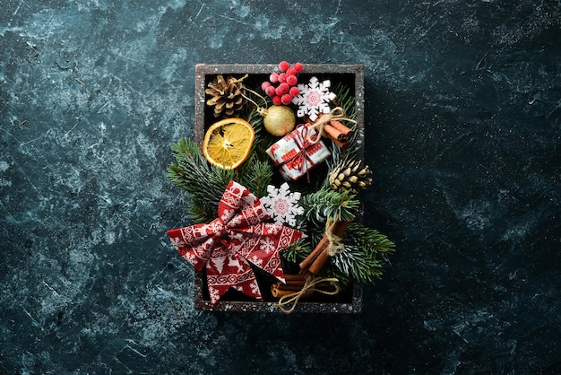 Christmas and New Year decorations in a wooden box Top view