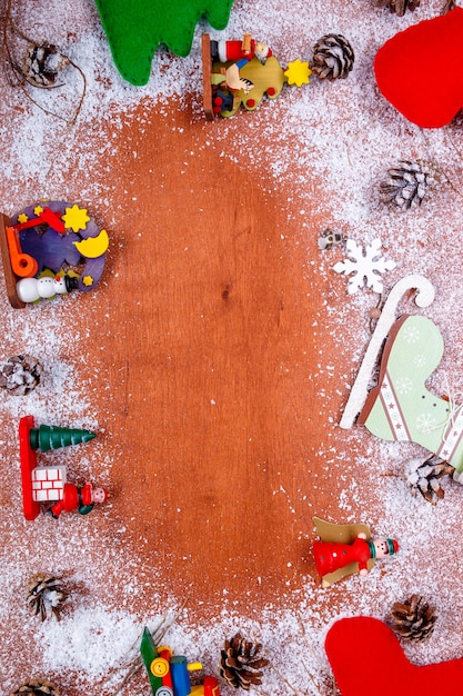 Christmas and New year frame for greeting card and wooden background with copy space.