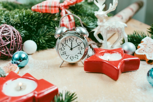 Christmas and New Year holiday decoration with alarm clock