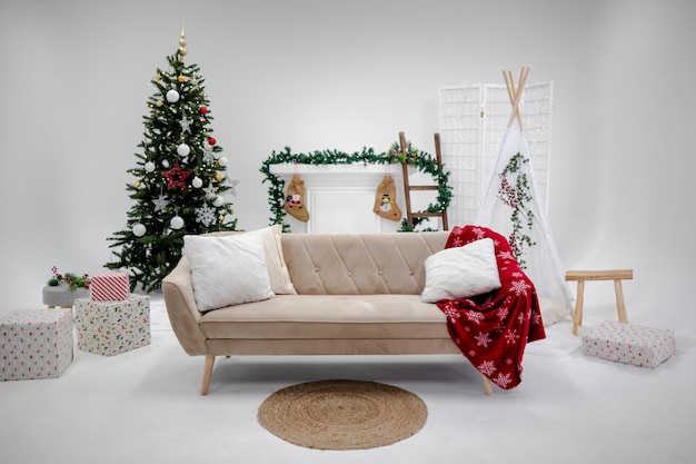 Christmas new year interior with decorated fir tree with garlands and balls present boxes standing a