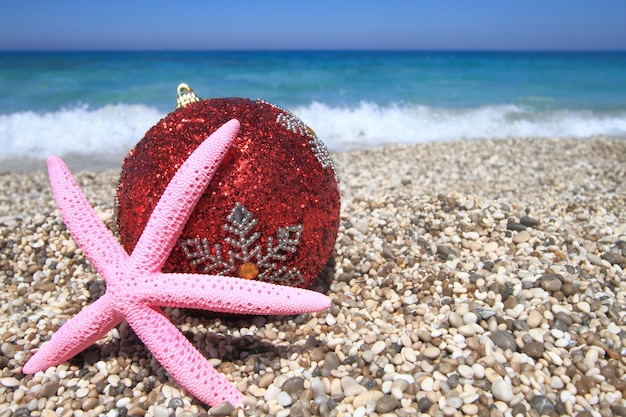 Christmas ornaments on the beach