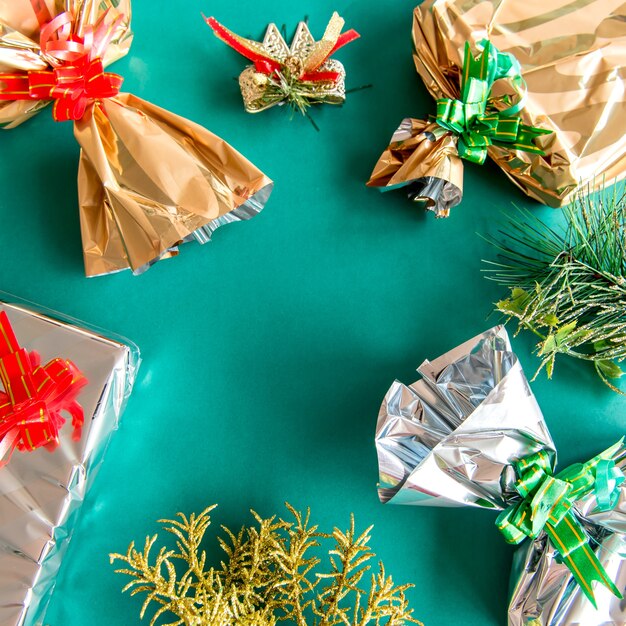 Christmas ornaments and gifts on red and green background