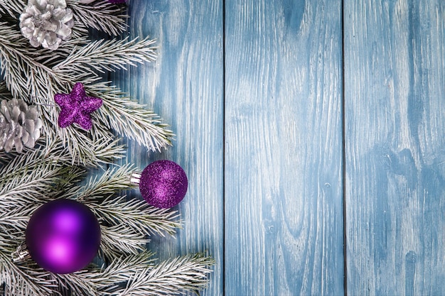 Christmas ornaments on the wooden background. Copy Space for text.