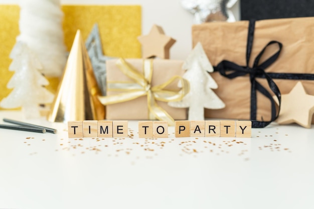 Christmas party time confetti gifts tree stars glitter ribbon Party time lettering New year 2023 2024