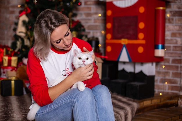 Christmas party winter holidays woman with cat