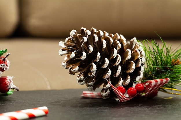 Christmas pine cone with place for text.