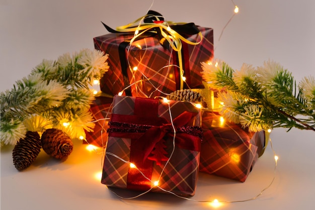 Christmas presents  in lights on white background.