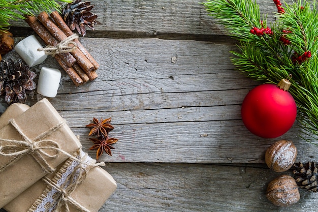 Christmas presents and symbols, rustic wood background