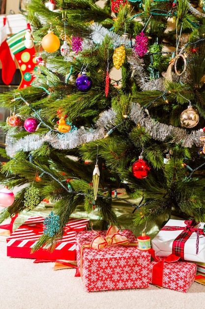 Christmas presents wrapped in colorful paper.