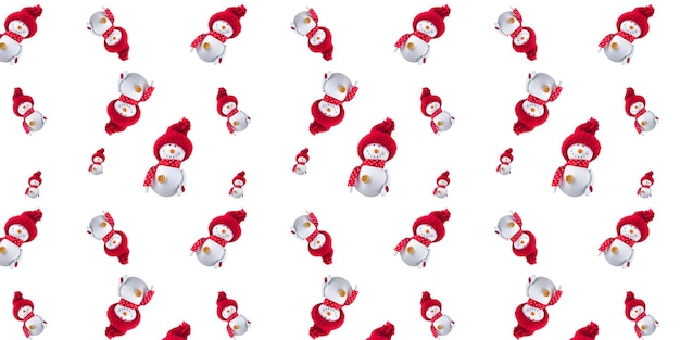 Christmas snowman in a knitted red hat on a white isolated background, seamless pattern