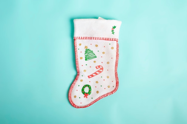 Christmas sock isolated on blue backgrund