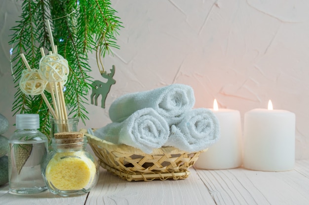 Christmas Spa treatments with candles and fir branches