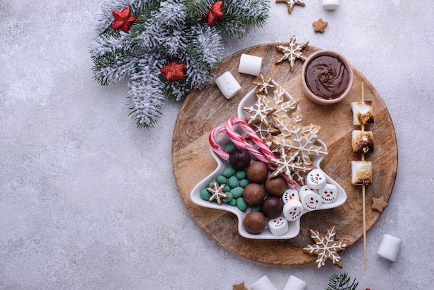 Christmas sweets cookies and marshmallow