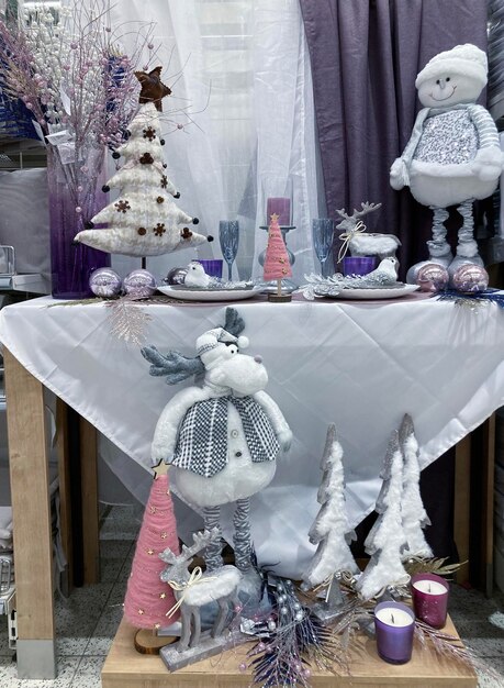 Christmas table decoration with tree and snowman