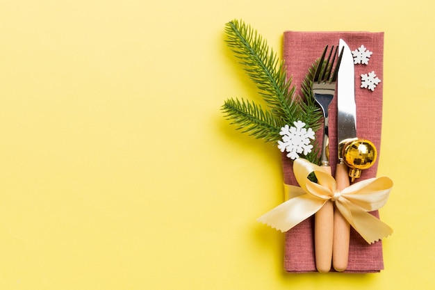 Christmas table place setting with knife napkin and fork Holidays new year background with copy space