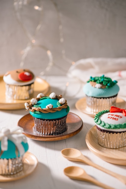 Christmas theme cupcakes on the table