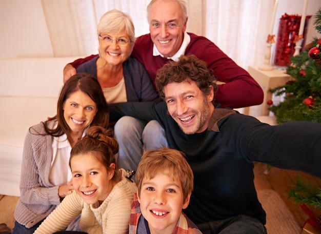 Christmas time is family time Portrait of a happy family on Christmas