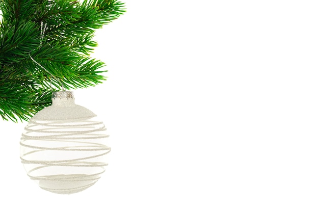 Christmas toy on fir branch with place for text, christmas concept.