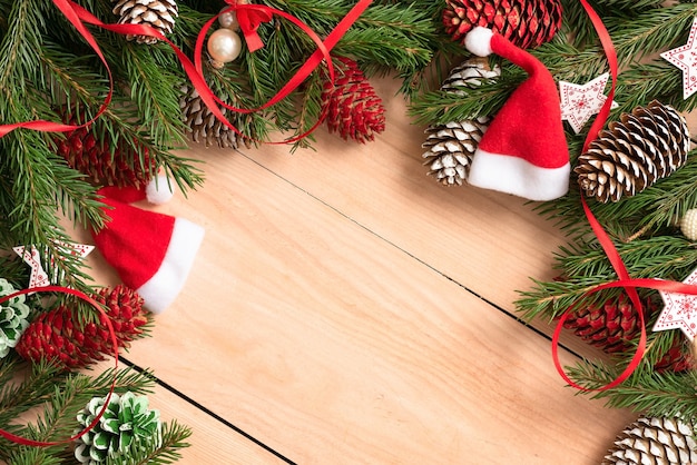 Christmas toys and cones with fir branches for Christmas.