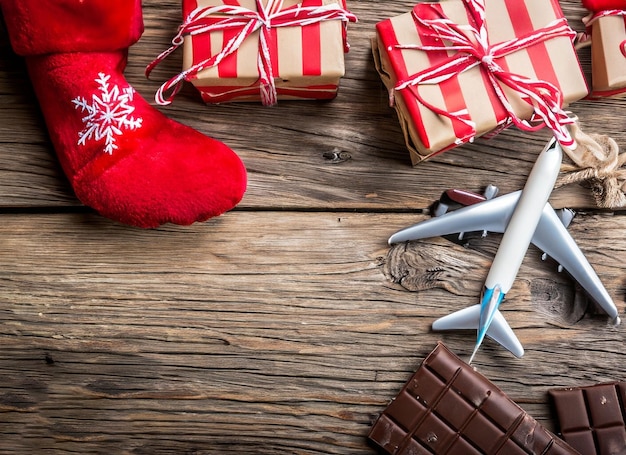 Christmas travel concept with toys gift and chocolate