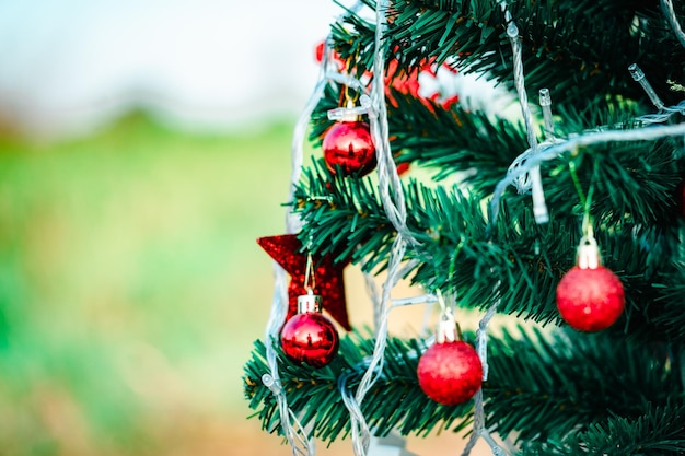 Christmas tree background and Decorated Christmas tree on blurred background