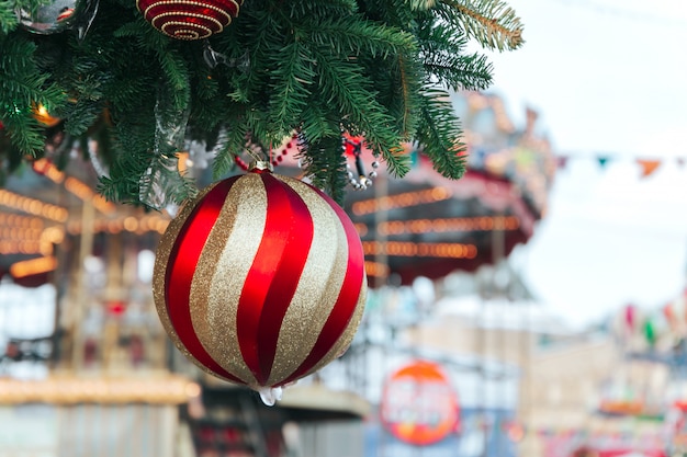 Christmas tree and Christmas decorations with snow, blurred