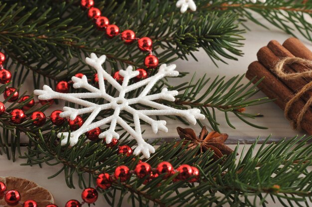 Christmas tree, cinnamon, beads and snowflake