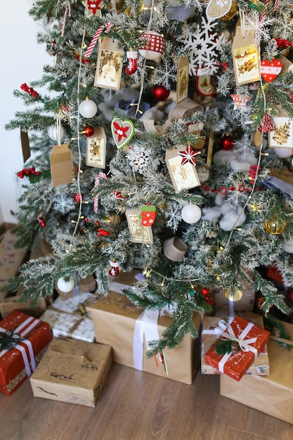 Christmas tree decorated with Christmas decorations and gifts