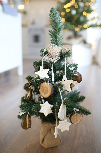 Christmas tree decorated with Christmas decorations and gifts